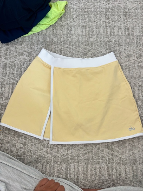 ALO Yoga Dresses & Skirts - ALO Yoga Pale Yellow Tennis Skort with White Trim